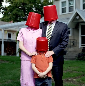 People with buckets on their heads